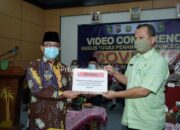 Bupati Inhil Serahkan Kode Desa Aplikasi eDMC-19 Secara Virtual