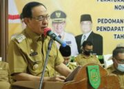 Pemkab Inhil Gelar Rapat Sosialisasi Permendagri No 64 Tahun 2020 Secara Virtual