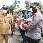 Kapolres Inhil Tinjau Giat Vaksinasi, Bansos dan Penanaman Bibit Jagung