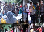 Kapolres Inhil Beri Sembako dan Layanan Kesehatan Gratis kepada Warga Desa Sialang Panjang yang Terdampak Banjir