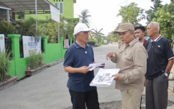 Bupati Inhil Tinjau Proses Pemeliharaan Jalan Trimas Lestari Tembilahan